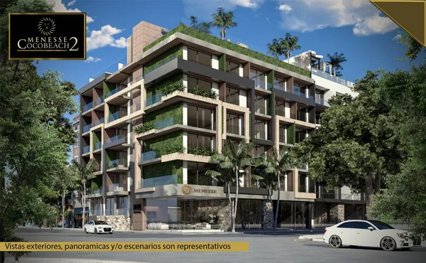 a front view of a building with lot of cars and trees