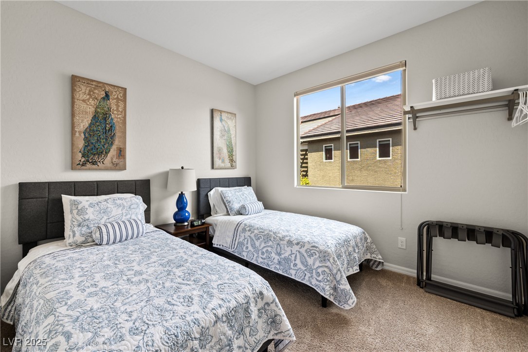 1221 Tortoise Ridge Mesquite, NV 89034 - Photo 14 of 56 Carpeted bedroom with baseboards