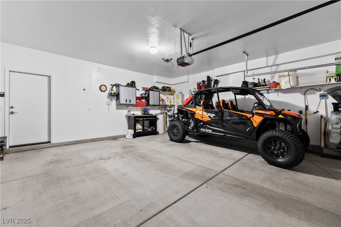 1221 Tortoise Ridge Mesquite, NV 89034 - Photo 32 of 56 Garage featuring baseboards and a garage door opener