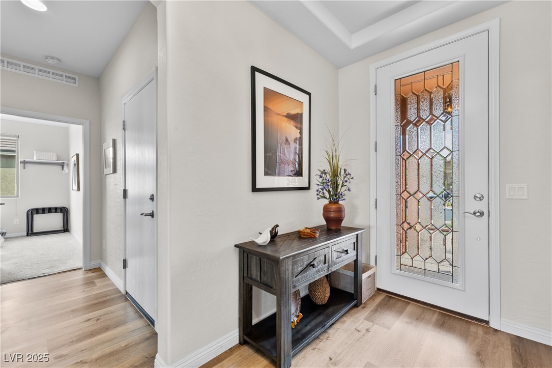 1221 Tortoise Ridge Mesquite, NV 89034 - Photo 8 of 56 Entryway with light wood finished floors