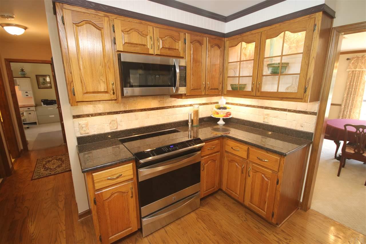 5017 Roland Road Pace, FL 32571 - Photo 14 of 50 Micro. & oven are convection. Cabinets w/pullouts.