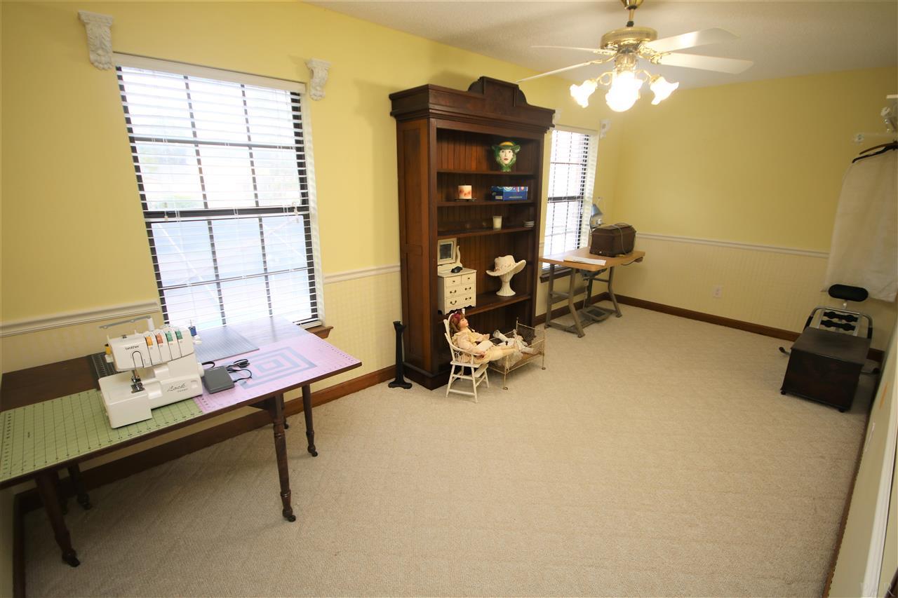 5017 Roland Road Pace, FL 32571 - Photo 33 of 50 chair rail, carpet & ceiling fan w/light.