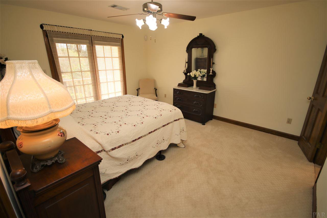 5017 Roland Road Pace, FL 32571 - Photo 35 of 50 French doors custom shades.