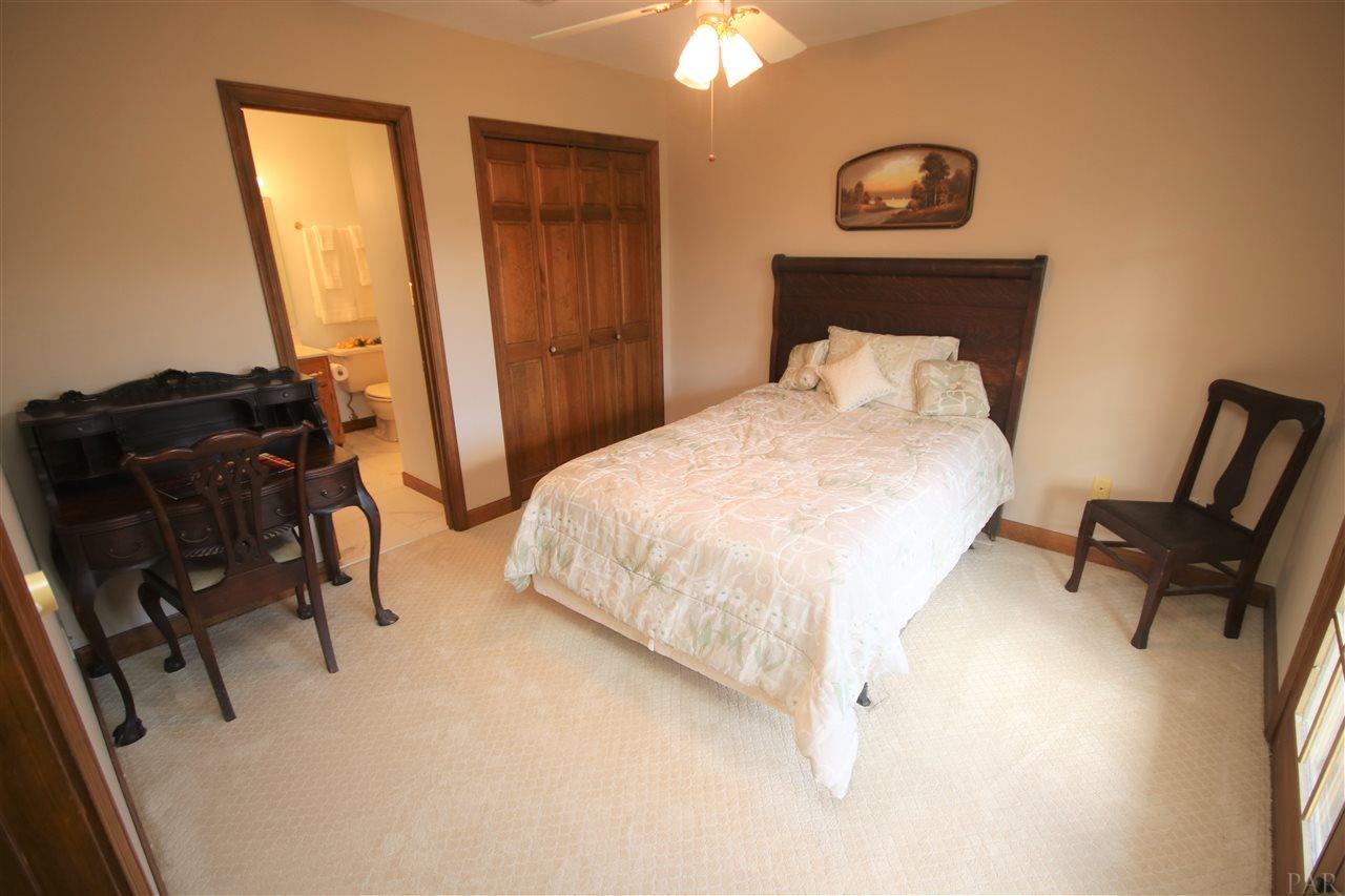 5017 Roland Road Pace, FL 32571 - Photo 40 of 50 New carpet 2019. En-suite bath to the left.