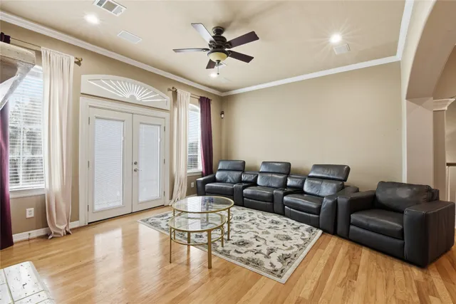 a living room with furniture and a window