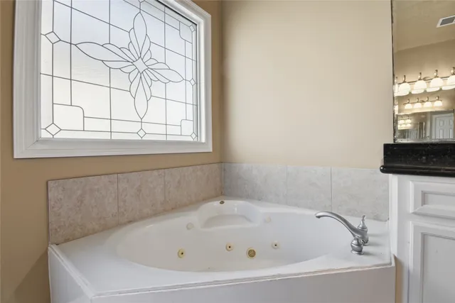 a bathroom with a bathtub