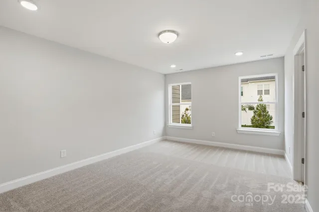 an empty room with a bathroom