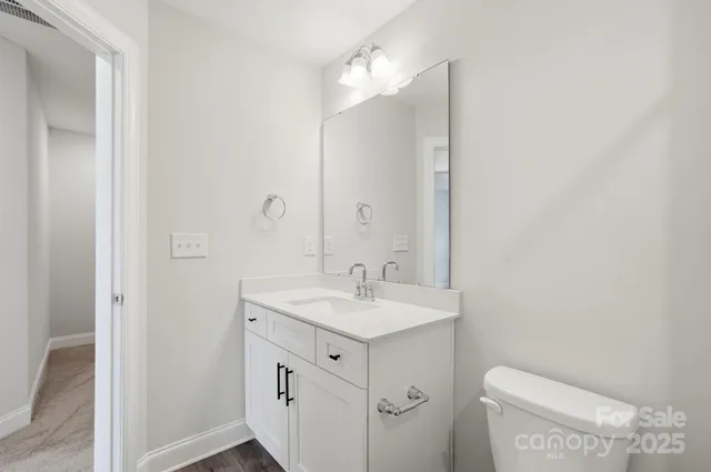 a bathroom with a bathtub and a toilet