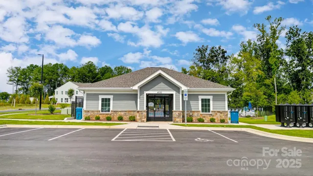 a view of swimming pool with a patio