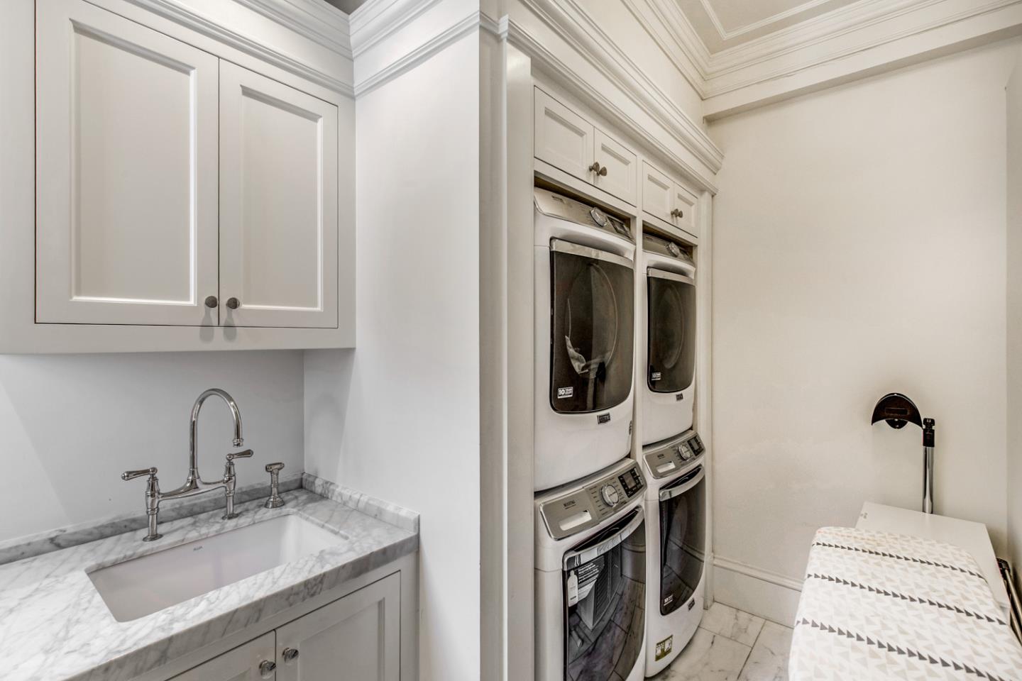 351 Walsh Road Atherton, CA 94027 - Photo 29 of 65 a bathroom with a sink a toilet and mirror