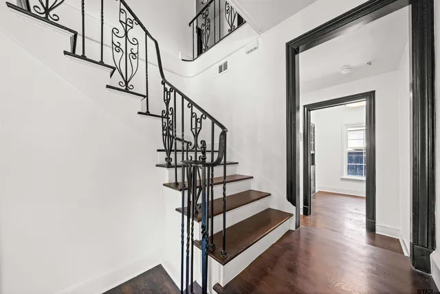 a view of entryway with wooden floor