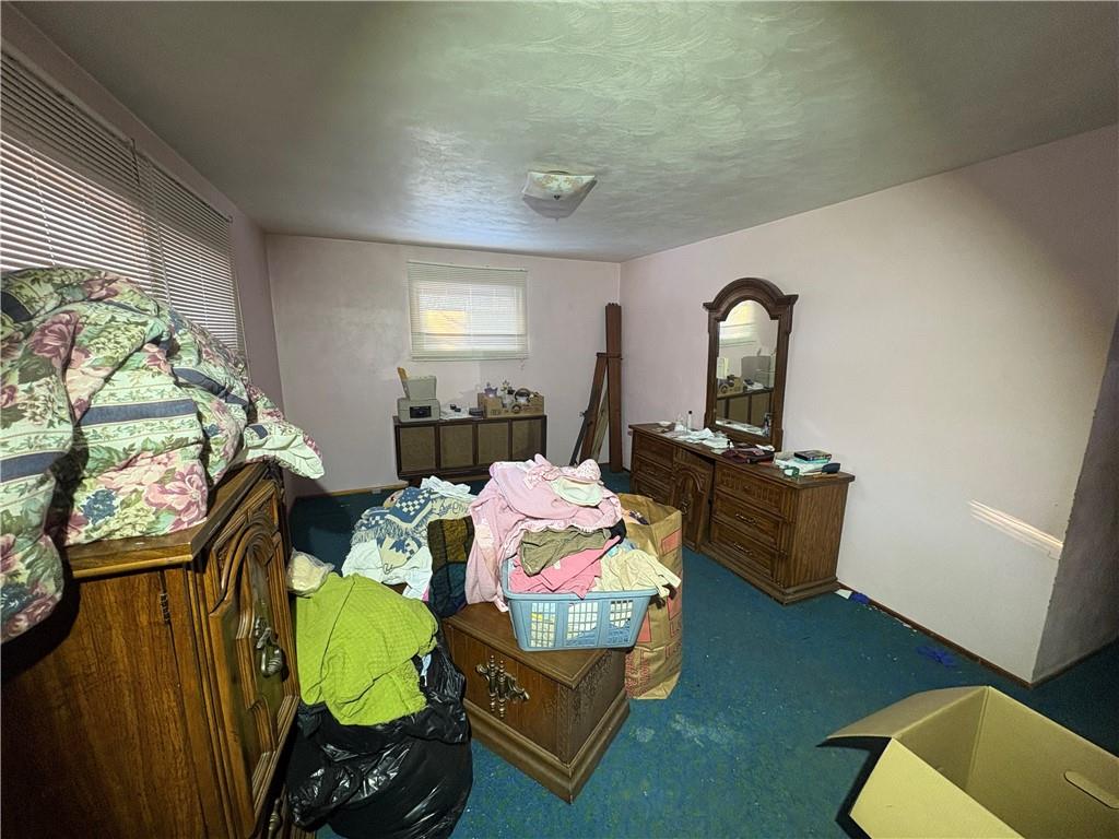 4134 South R 1022 New Brighton, PA 15066 - Photo 14 of 27 a living room with furniture and a table