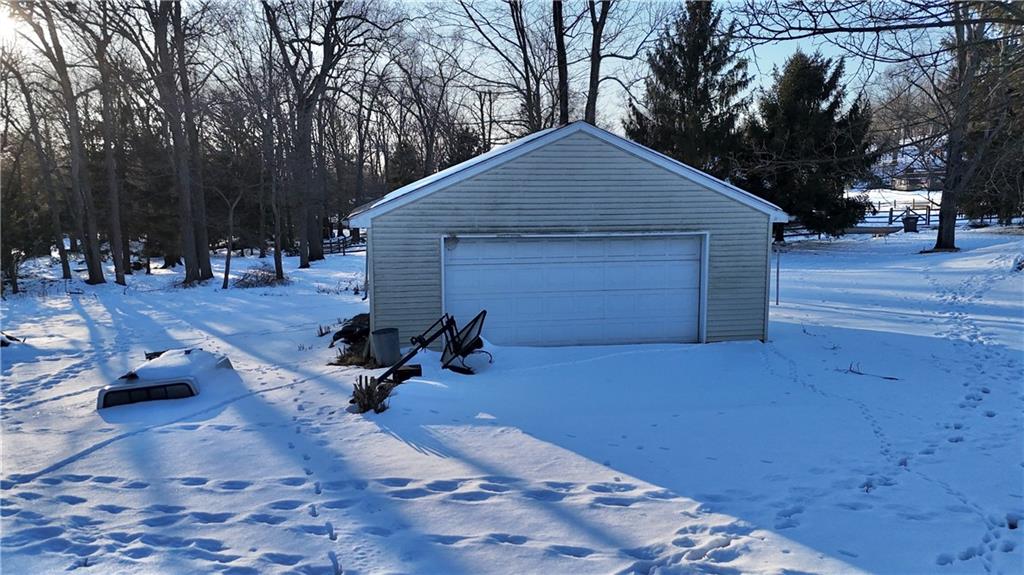 4134 South R 1022 New Brighton, PA 15066 - Photo 7 of 27 a backyard of a house with table and chairs