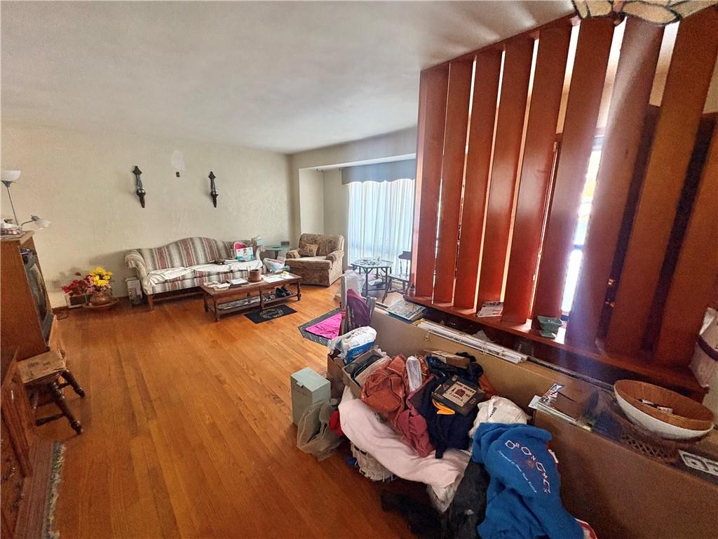4134 South R 1022 New Brighton, PA 15066 - Photo 8 of 27 a living room with furniture and a window