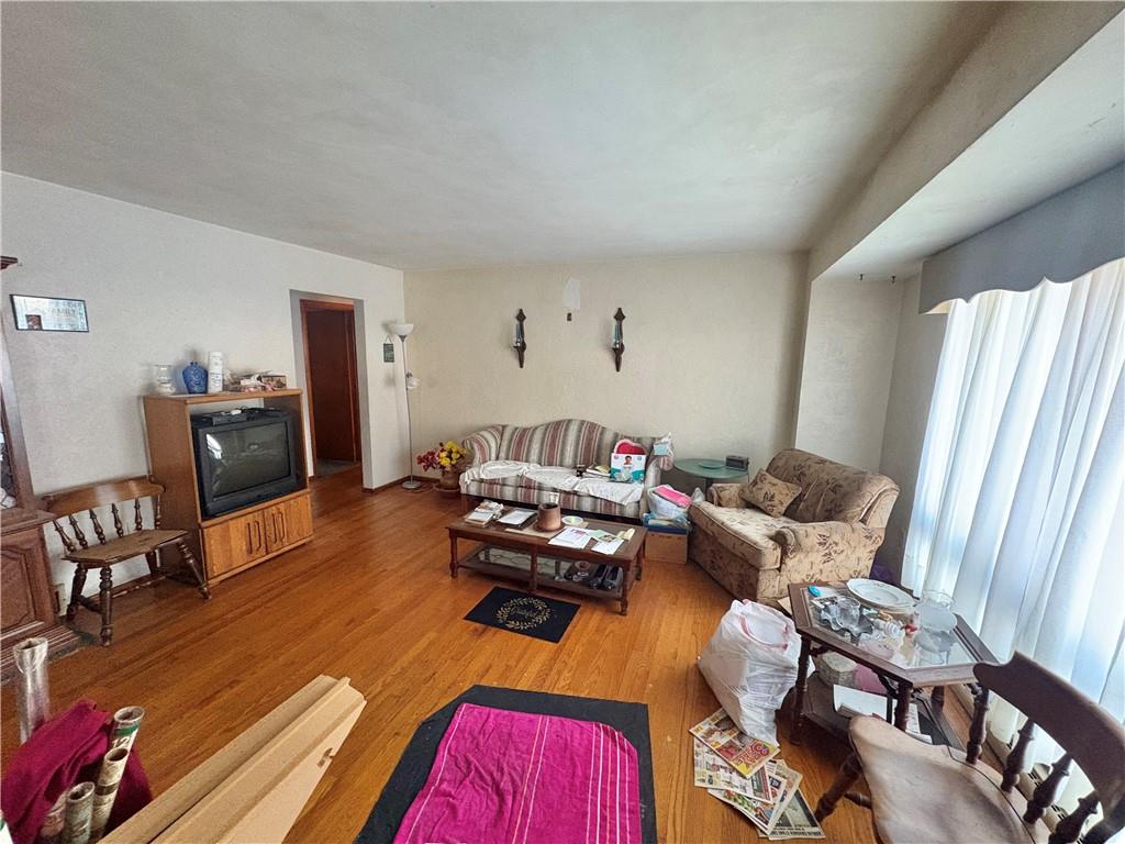 4134 South R 1022 New Brighton, PA 15066 - Photo 9 of 27 a living room with furniture and a wooden floor