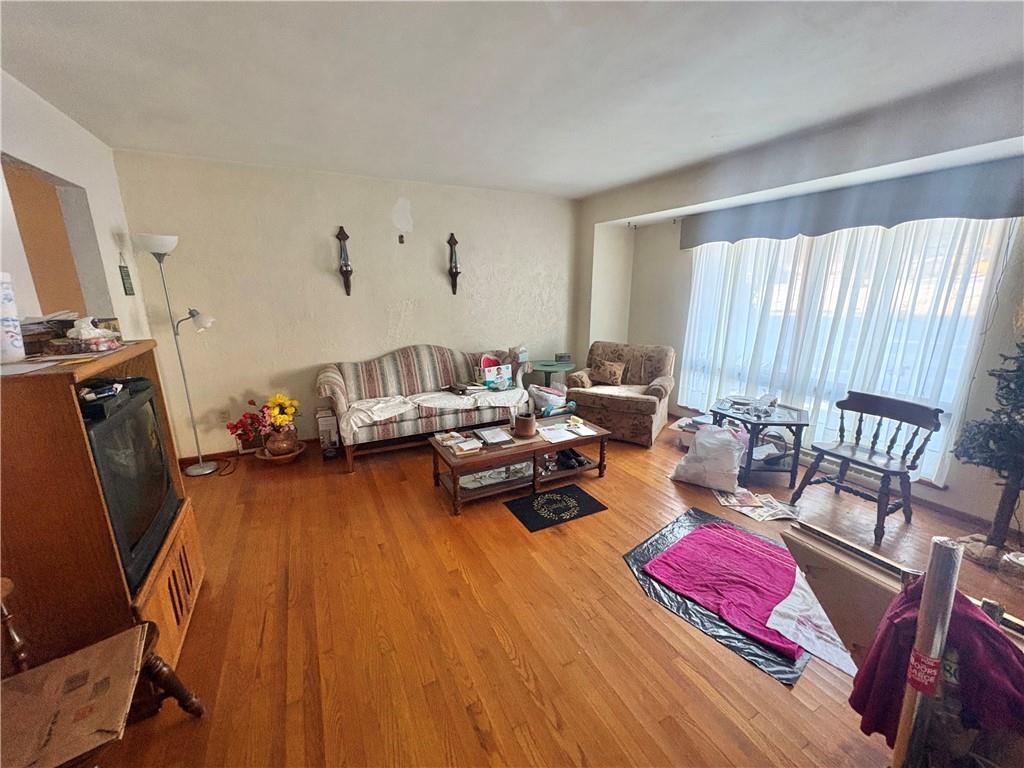 4134 South R 1022 New Brighton, PA 15066 - Photo 10 of 27 a living room with furniture and a wooden floor