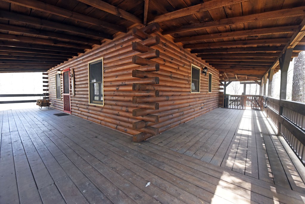 545 Laurel Circle Blue Ridge, GA 30513 - Photo 11 of 54 a view of deck with wooden floor and roof