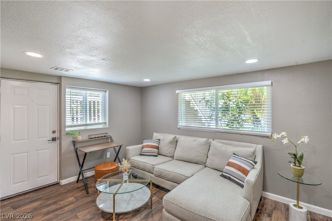623 California Avenue Boulder City, NV 89005 - Photo 31 of 38 Two Family Rooms: Upstairs Family Room with Sliding Glass Door to Deck/Patio, and a Downstairs Family Room with Access to Exterior