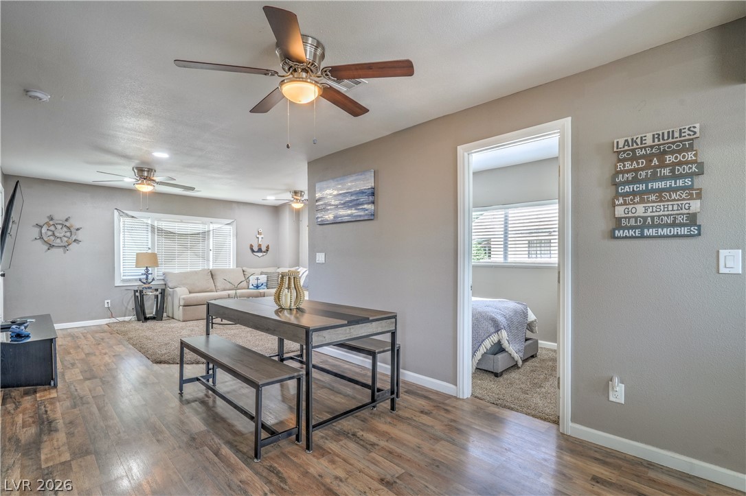 623 California Avenue Boulder City, NV 89005 - Photo 8 of 38 Dining Area w/ Ceiling Fan and Laminate Wood Flooring