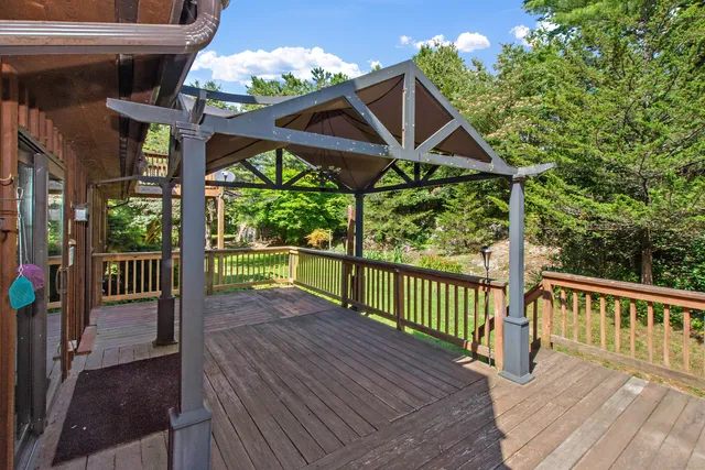 a view of a house with porch and wooden floor