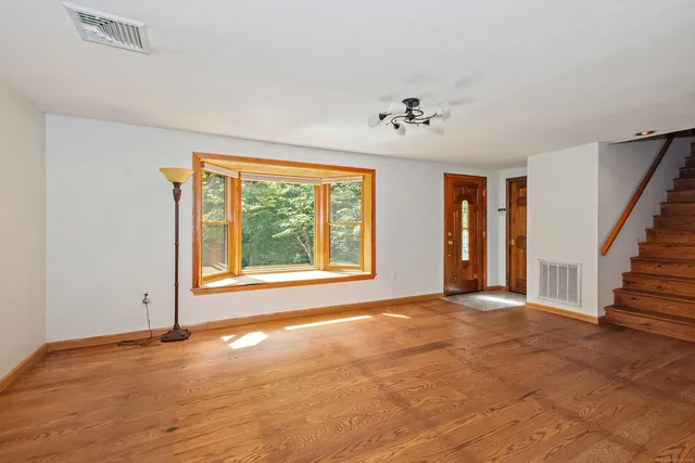 a kitchen with a sink stove and microwave
