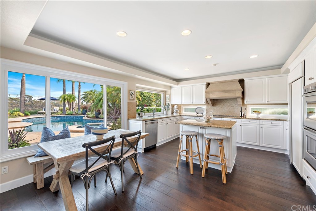 28 Bethany Laguna Niguel, CA 92677 - Photo 11 of 50 Enjoy backyard views in the gourmet kitchen with center island, stainless steel appliances, ample counter & storage space, and sunny breakfast nook.