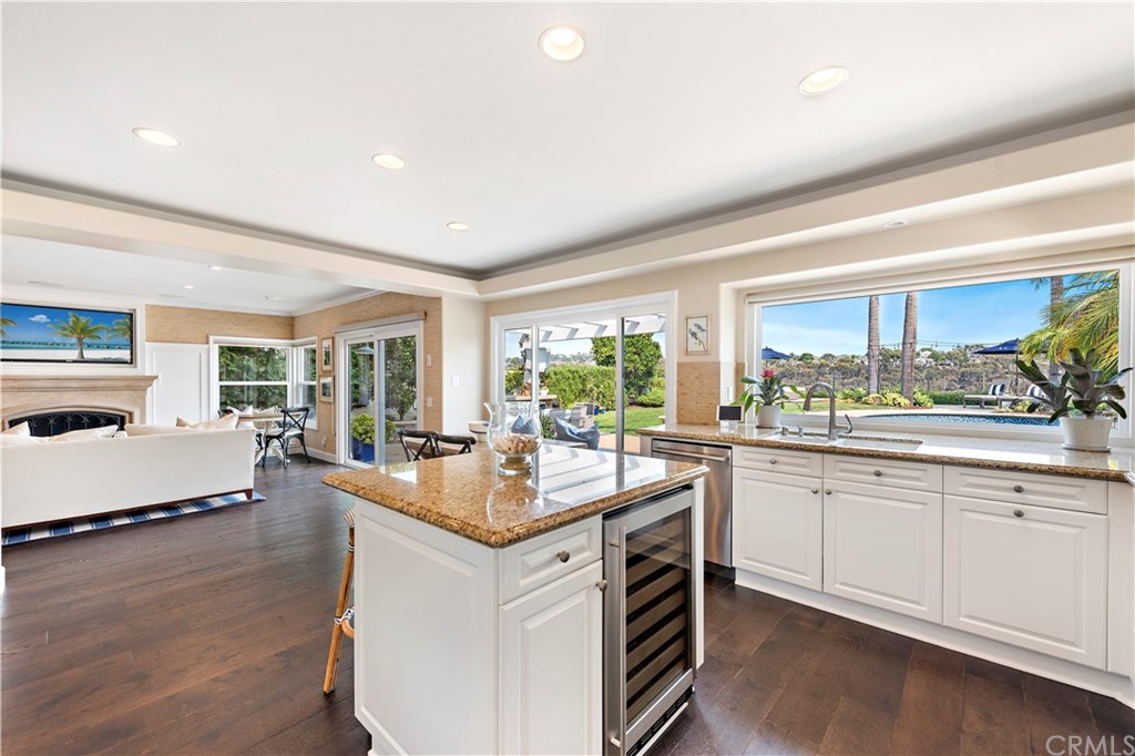 28 Bethany Laguna Niguel, CA 92677 - Photo 14 of 50 Enjoy backyard views in the gourmet kitchen with center island, stainless steel appliances, ample counter & storage space, and sunny breakfast nook.
