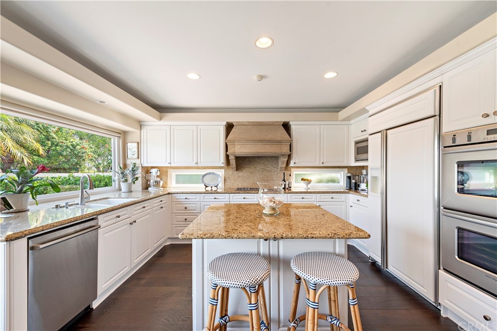 28 Bethany Laguna Niguel, CA 92677 - Photo 16 of 50 Enjoy eating and gathering with your friends and family in the beautiful kitchen space