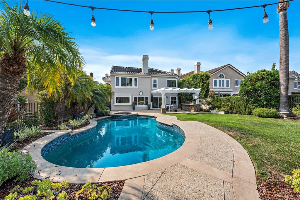 28 Bethany Laguna Niguel, CA 92677 - Photo 37 of 50 Truly an ENTERTAINER’S DREAM with pool and spa, built in BBQ, several seating areas, meticulously maintained lawn & coastal breezes