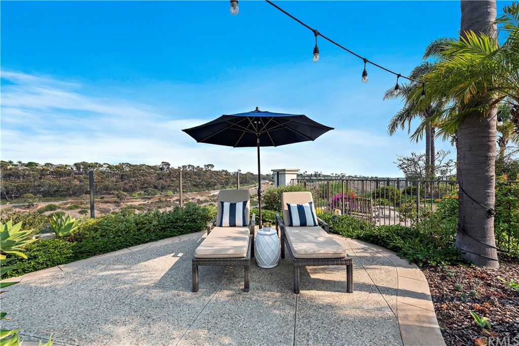28 Bethany Laguna Niguel, CA 92677 - Photo 38 of 50 The resort-inspired backyard is surrounded by lush towering greenery and PANORAMIC ocean, canyon, and mountain views!