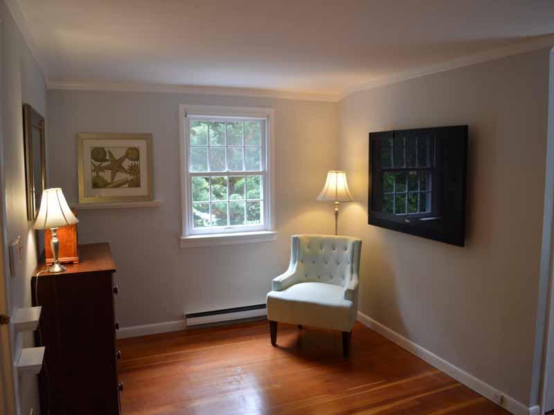34 Meeker Court Rowayton, CT 06853 - Photo 13 of 22 a living room with furniture and a window