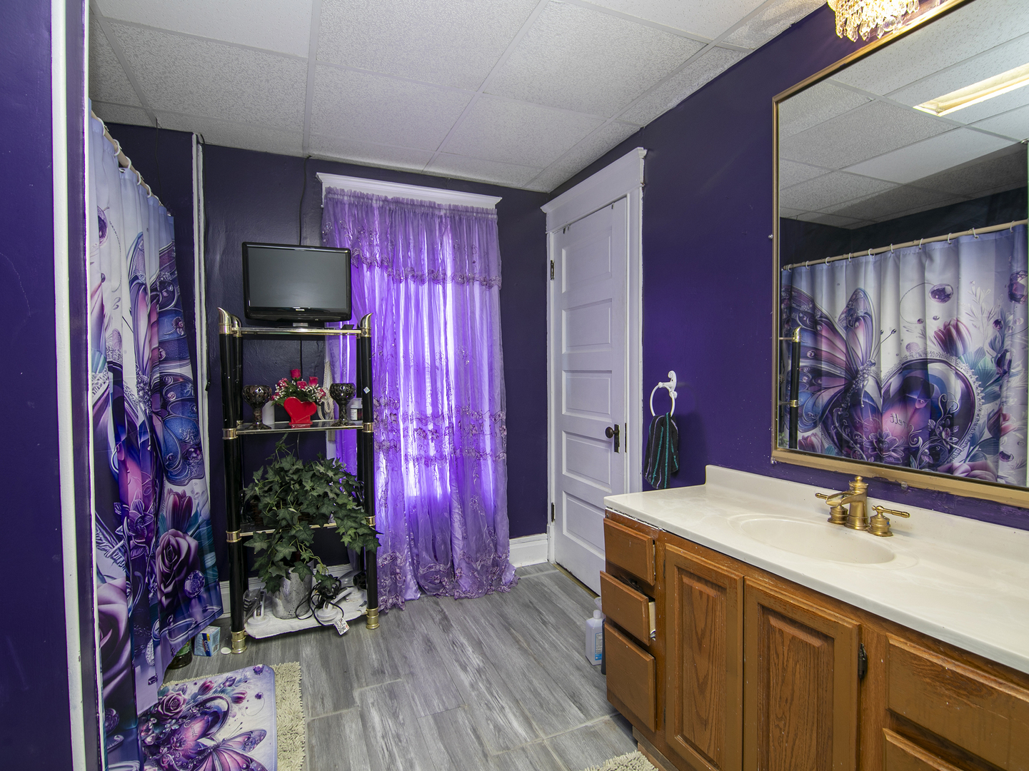 971 North Cleveland Avenue Kankakee, IL 60901 - Photo 15 of 19 a view of bathroom with a sink and wooden floor