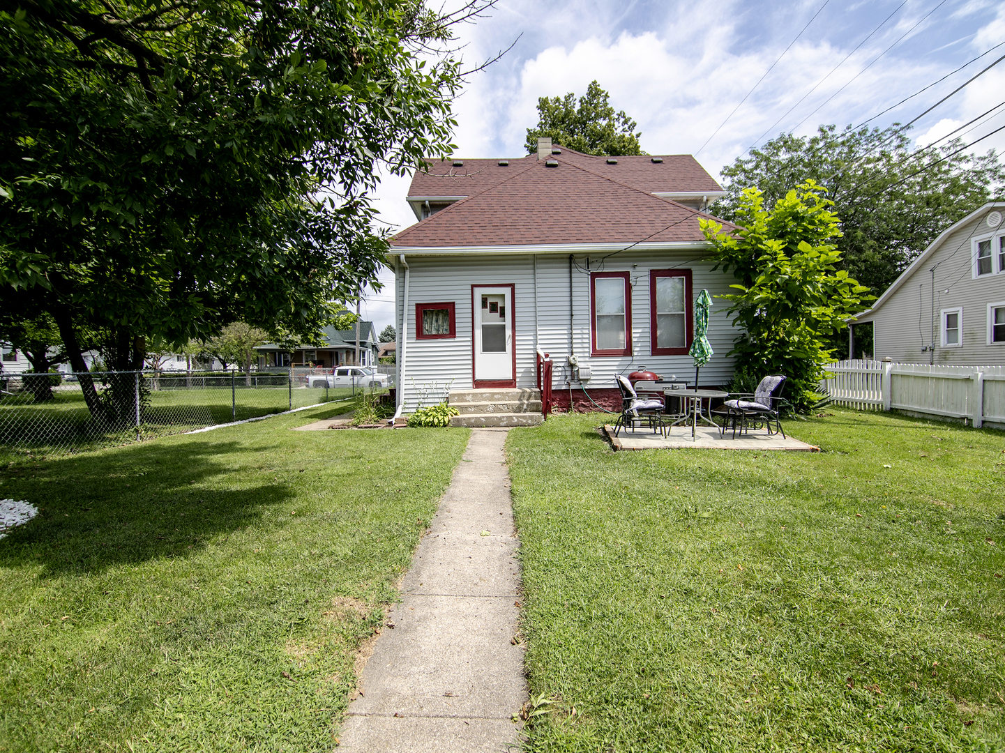 971 North Cleveland Avenue Kankakee, IL 60901 - Photo 18 of 19 a front view of house with yard and outdoor seating