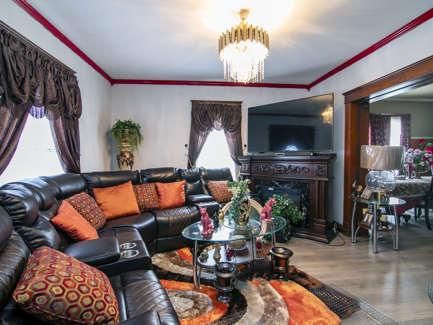 971 North Cleveland Avenue Kankakee, IL 60901 - Photo 4 of 19 a living room with furniture a flat screen tv and a fireplace