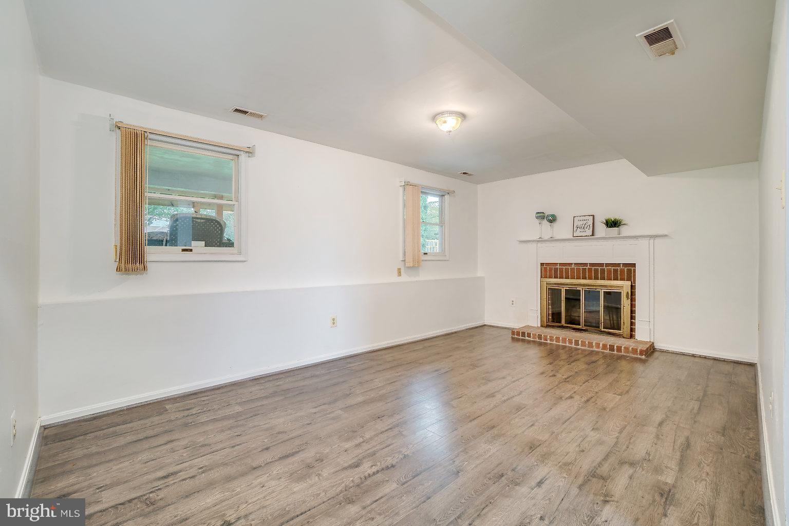 6 Robin Ridge Court Baltimore, MD 21234 - Photo 27 of 35 LL Family Rm w/ wood FP