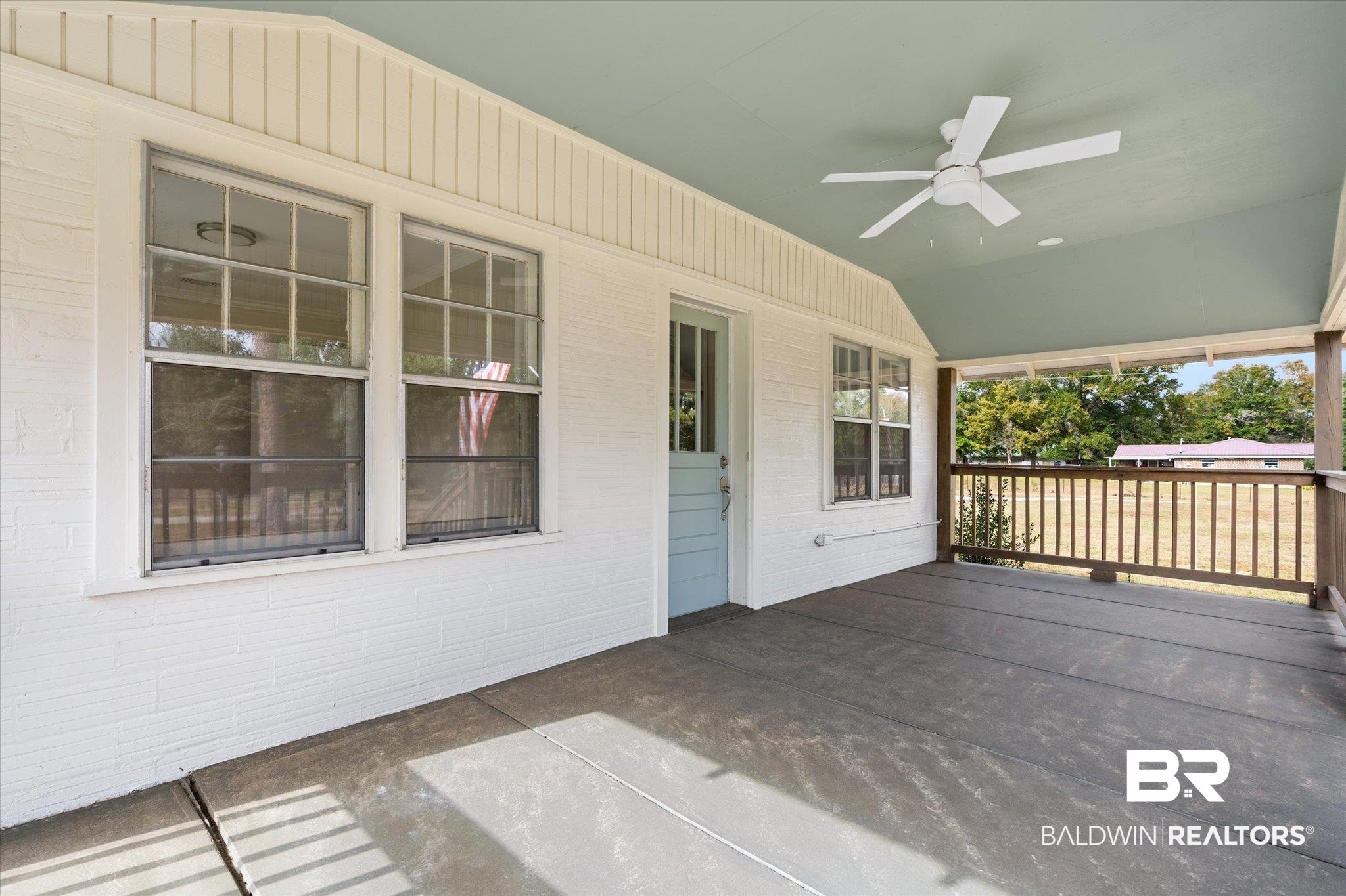 4630 General Road Mobile, AL 36619 - Photo 17 of 33 Deck with ceiling fan and covered porch