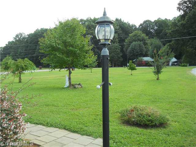 2564 Gideon Grove Road Stokesdale, NC 27357 - Photo 15 of 16 Yard/Garden. View of front yard