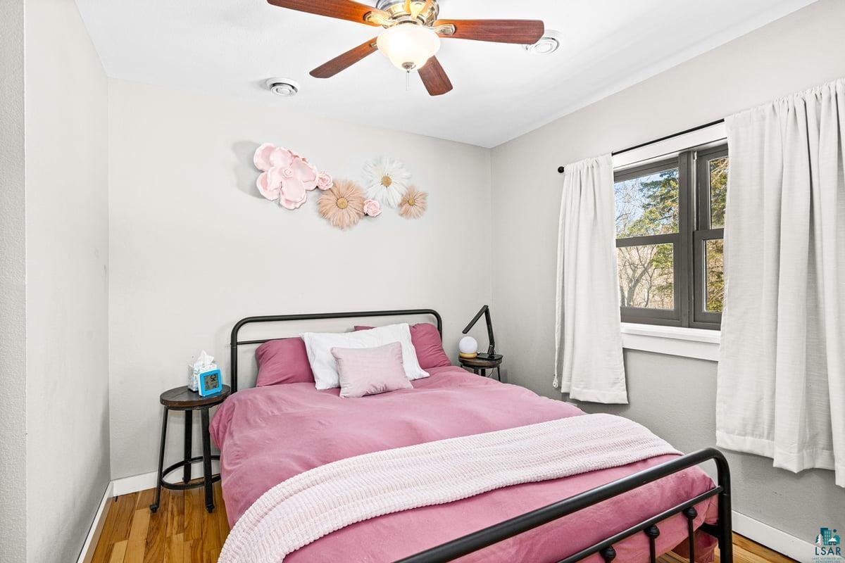 27 West Stark Road Esko, MN 55733 - Photo 29 of 47 Bedroom with wood finished floors and a ceiling fan