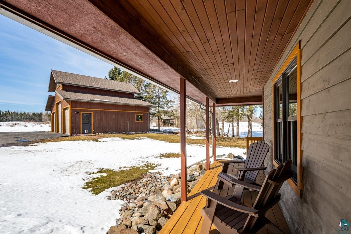 27 West Stark Road Esko, MN 55733 - Photo 43 of 47 Snow covered deck with an outdoor structure