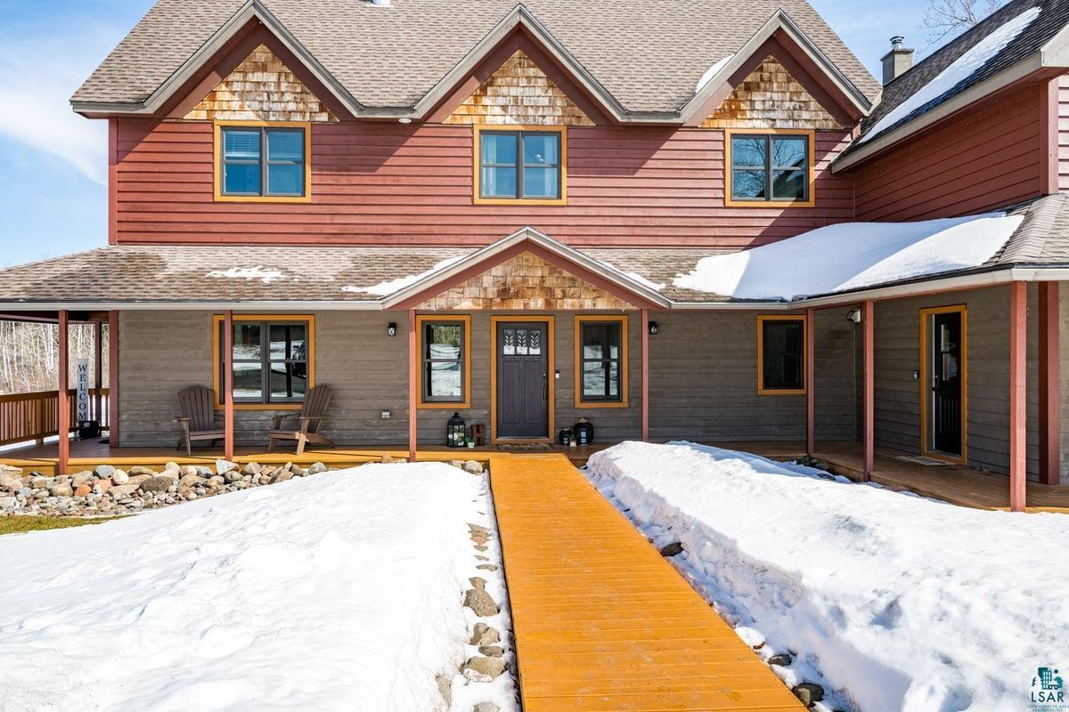 27 West Stark Road Esko, MN 55733 - Photo 47 of 47 Chalet / cabin with a shingled roof and covered porch