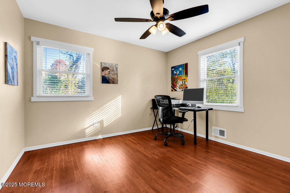 345 Green Grove Road Tinton Falls, NJ 07712 - Photo 31 of 80 a view of a workspace with furniture and a window