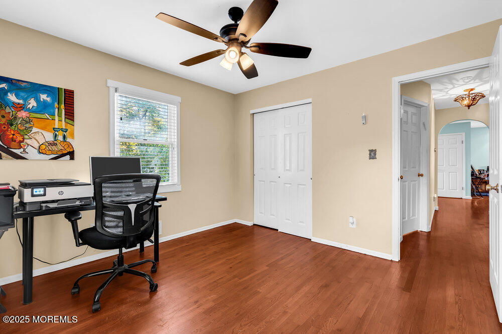 345 Green Grove Road Tinton Falls, NJ 07712 - Photo 32 of 80 a view of a workspace with furniture and a window
