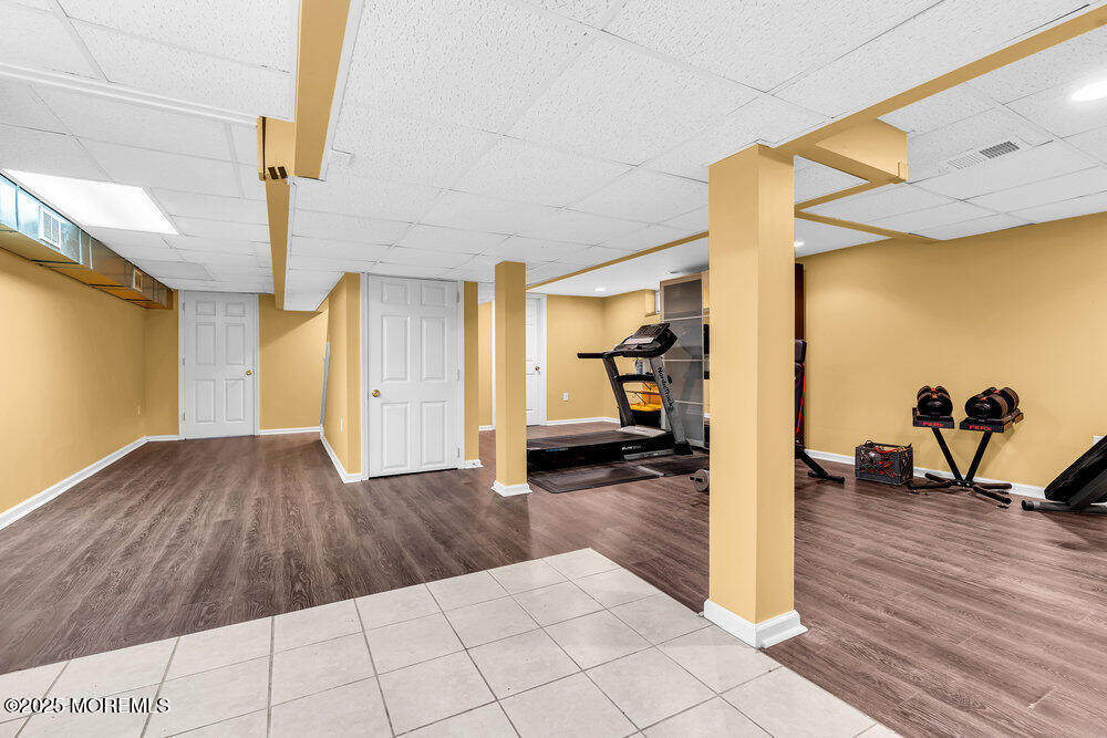 345 Green Grove Road Tinton Falls, NJ 07712 - Photo 35 of 80 a view interior of the house and hardwood floor