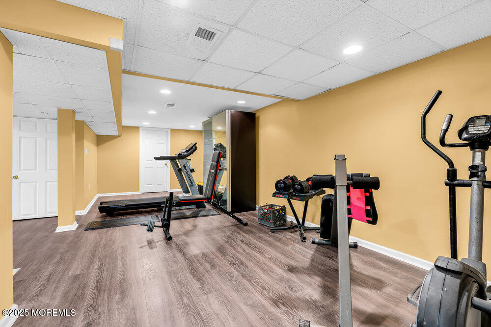345 Green Grove Road Tinton Falls, NJ 07712 - Photo 36 of 80 a view of a room with gym equipment