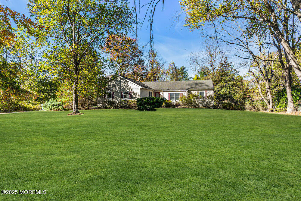 345 Green Grove Road Tinton Falls, NJ 07712 - Photo 45 of 80 a view of house with garden space and trees