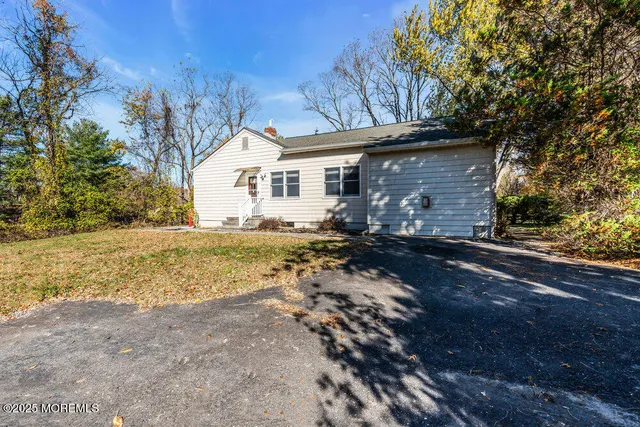 an aerial view of residential building with parking space
