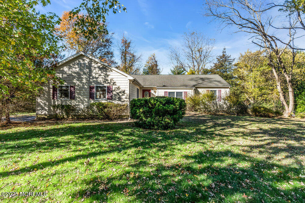 345 Green Grove Road Tinton Falls, NJ 07712 - Photo 57 of 80 a view of a house with a yard