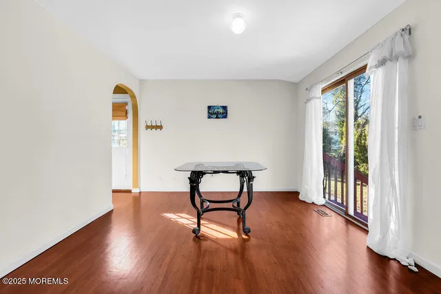 a view of a backyard with a garden