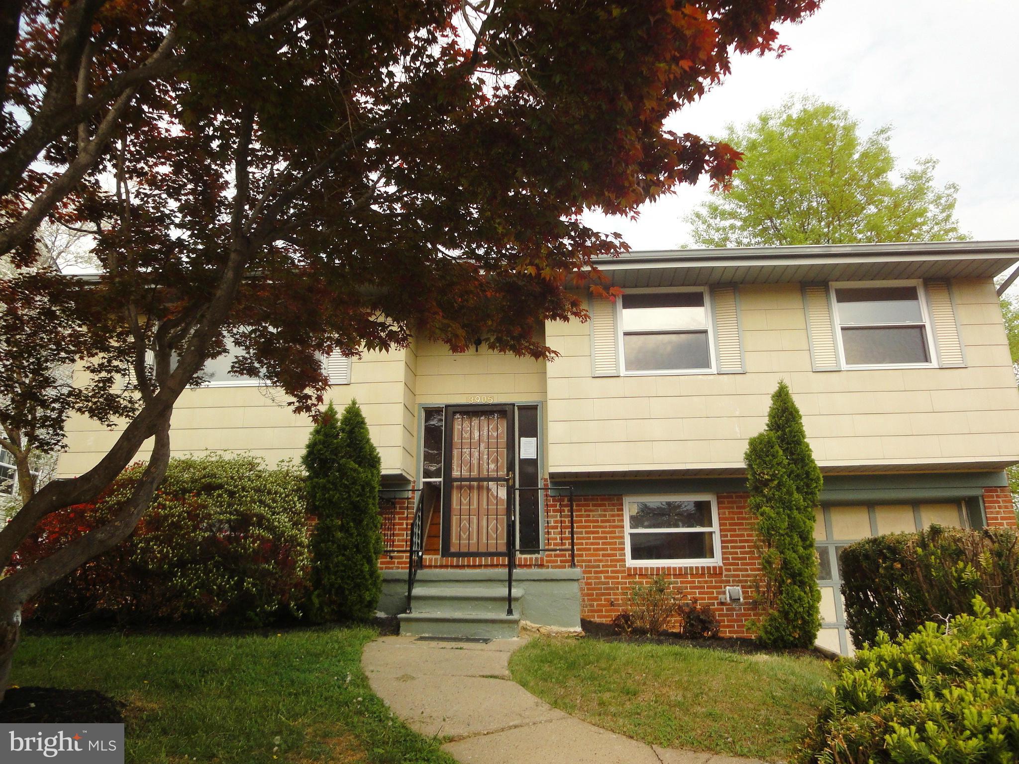 3905 Zurich Road Randallstown, MD 21133 - Photo 2 of 13 front view of house with a yard