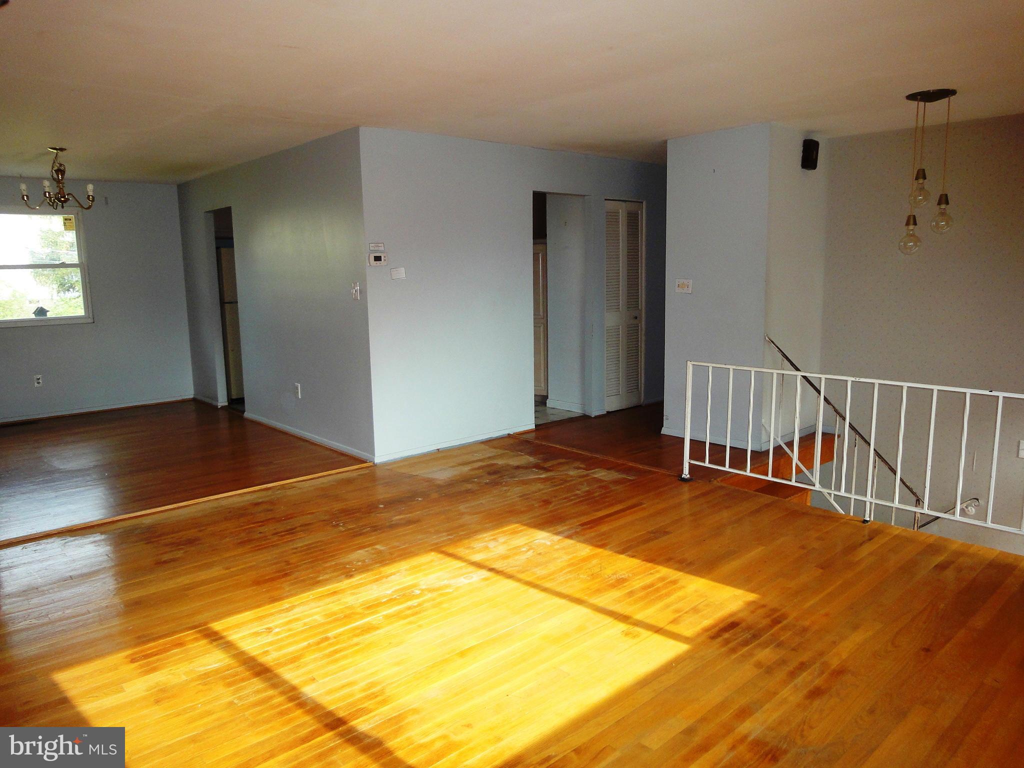 3905 Zurich Road Randallstown, MD 21133 - Photo 3 of 13 a view of a room with wooden floor